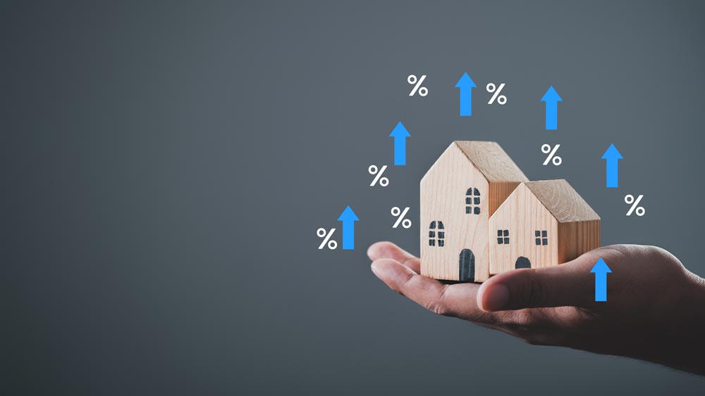 OECD: Razbremenite plače, obdavčite nepremičnine